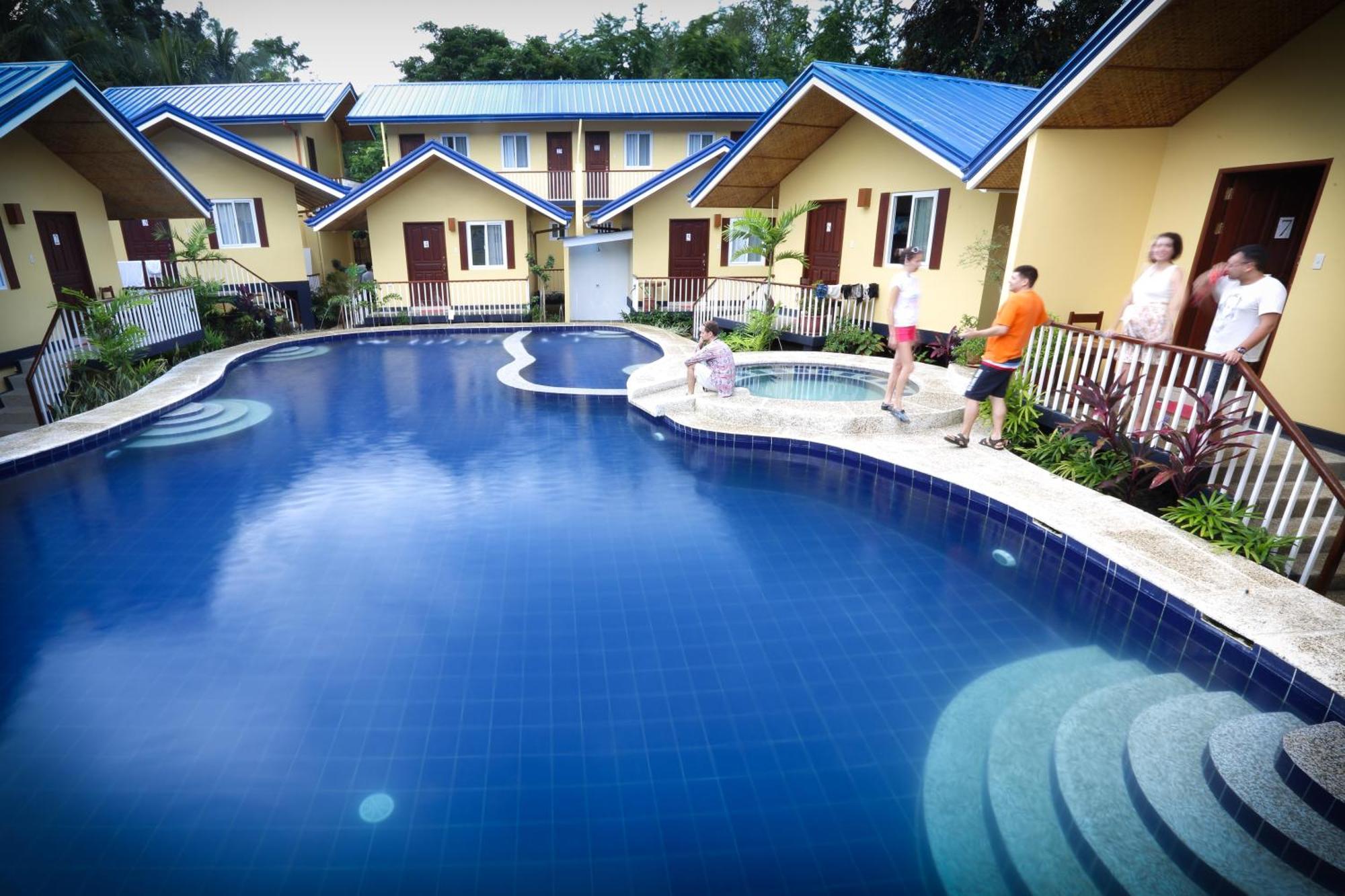 Blue Lagoon Inn & Suites Puerto Princesa Екстериор снимка