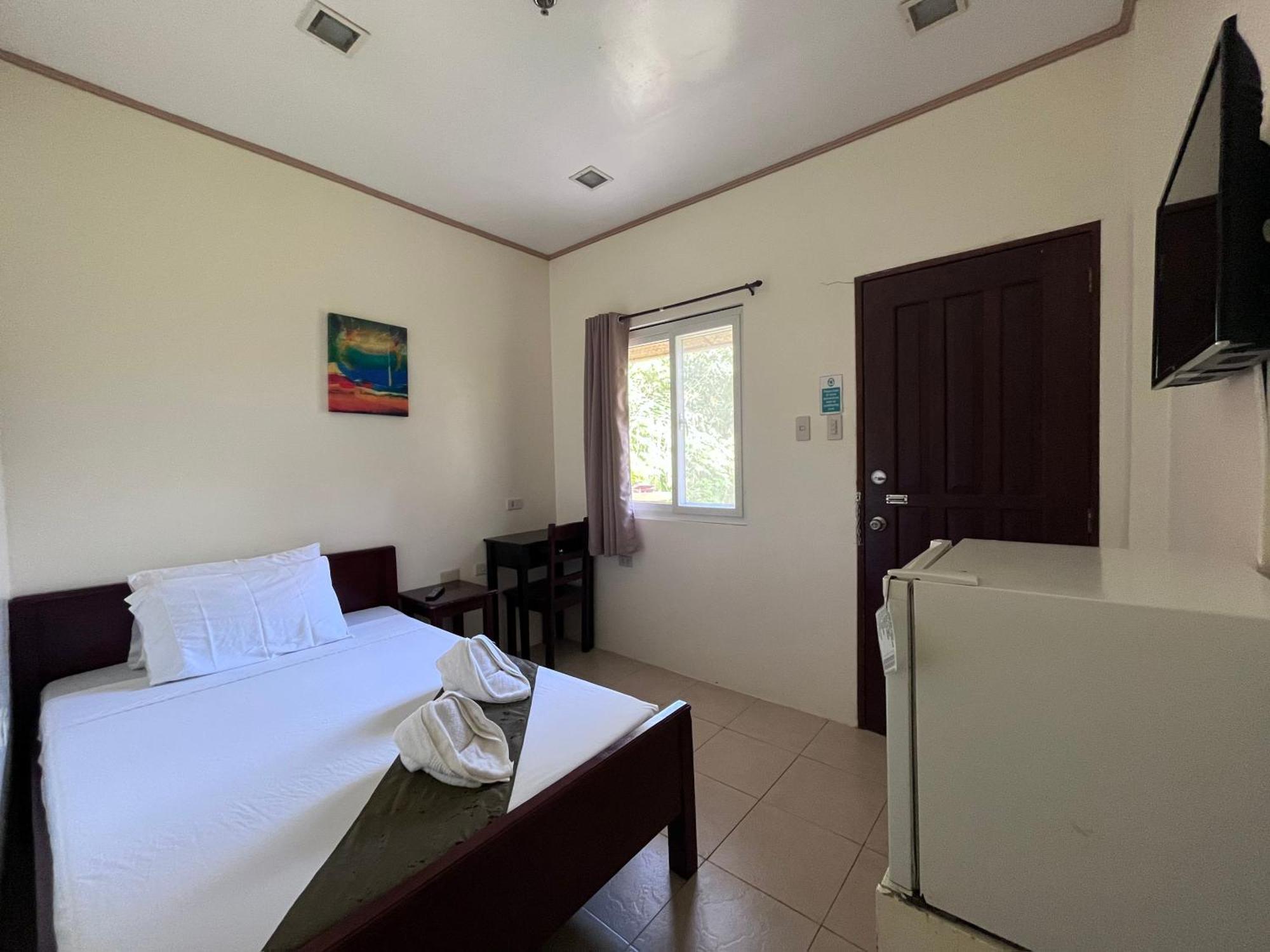 Blue Lagoon Inn & Suites Puerto Princesa Екстериор снимка
