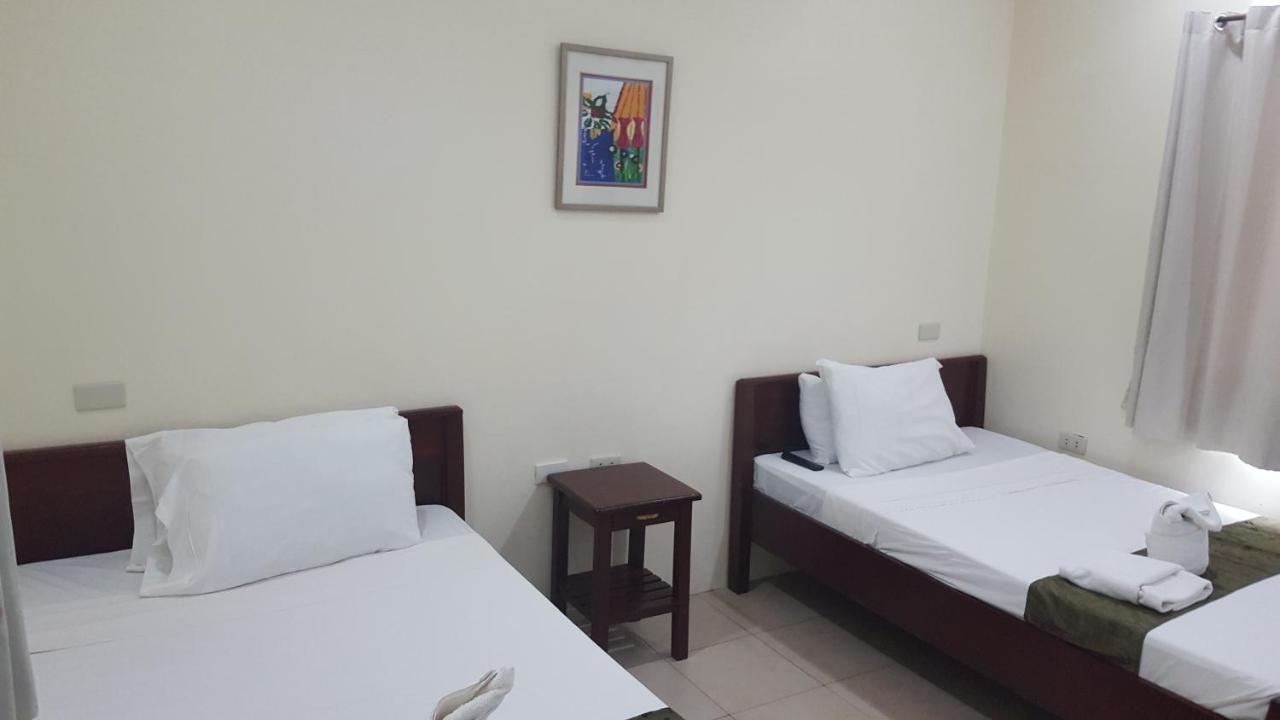 Blue Lagoon Inn & Suites Puerto Princesa Екстериор снимка