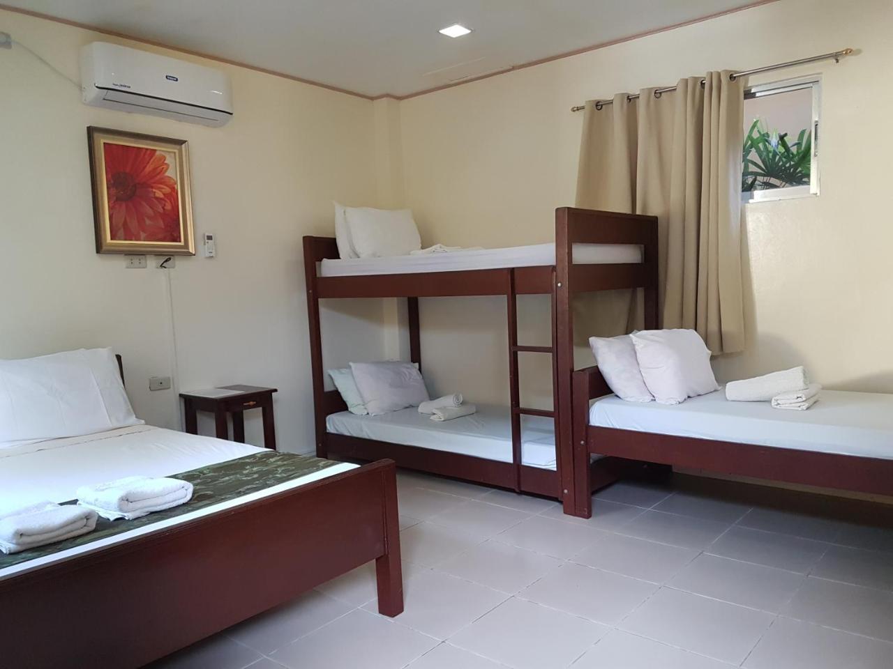 Blue Lagoon Inn & Suites Puerto Princesa Екстериор снимка