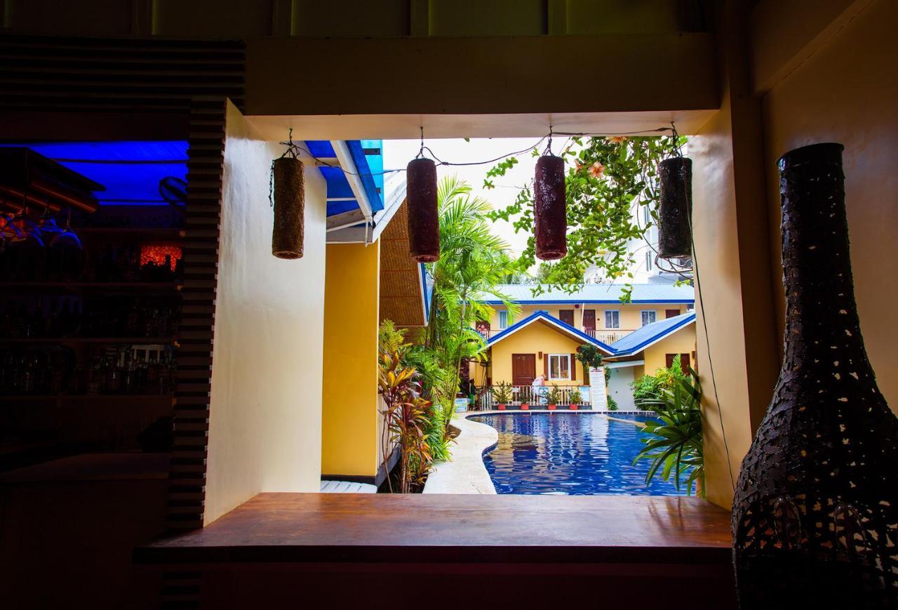 Blue Lagoon Inn & Suites Puerto Princesa Екстериор снимка